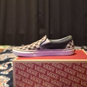 Black and grey checkerd vans slip ons